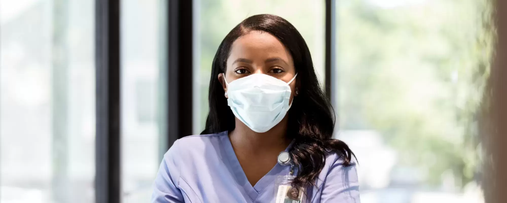 A nurse with protective mask on