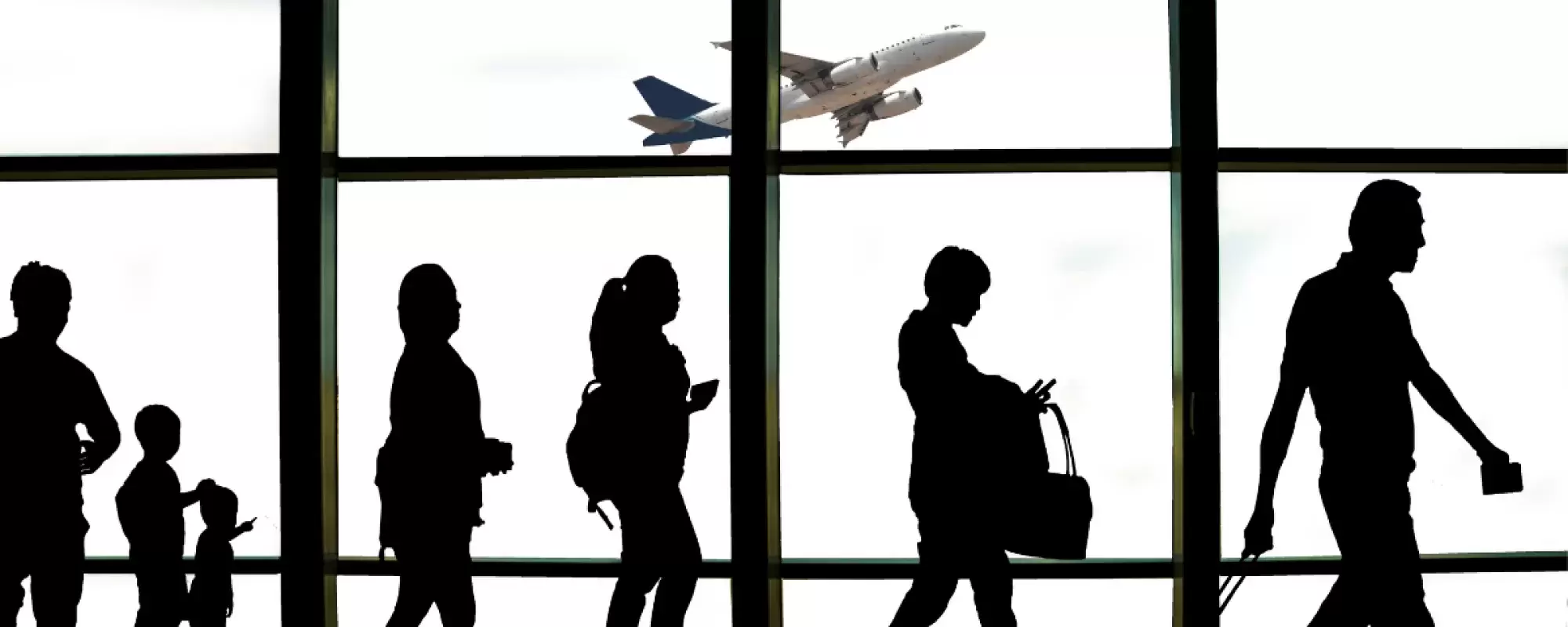 shadows of people at airport