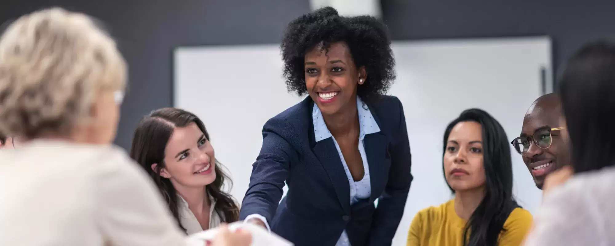 Woman meeting with her team