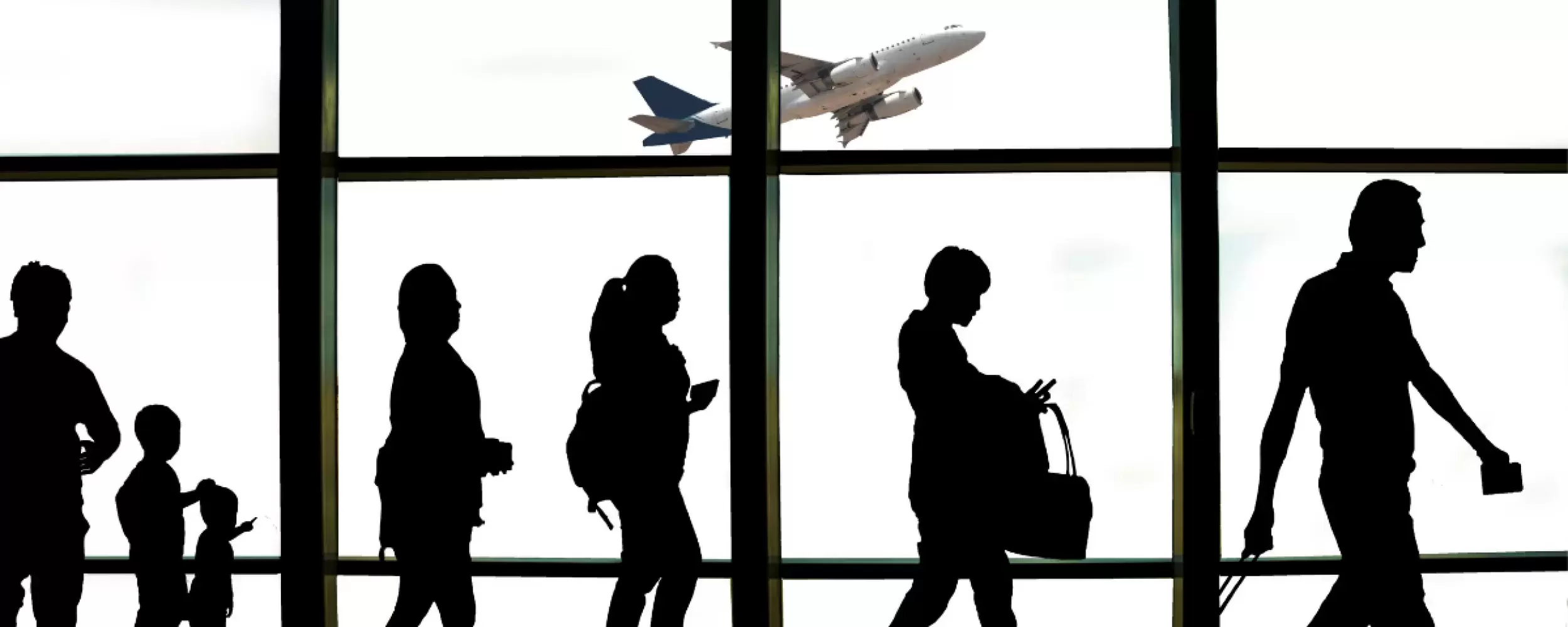 shadows of people at airport